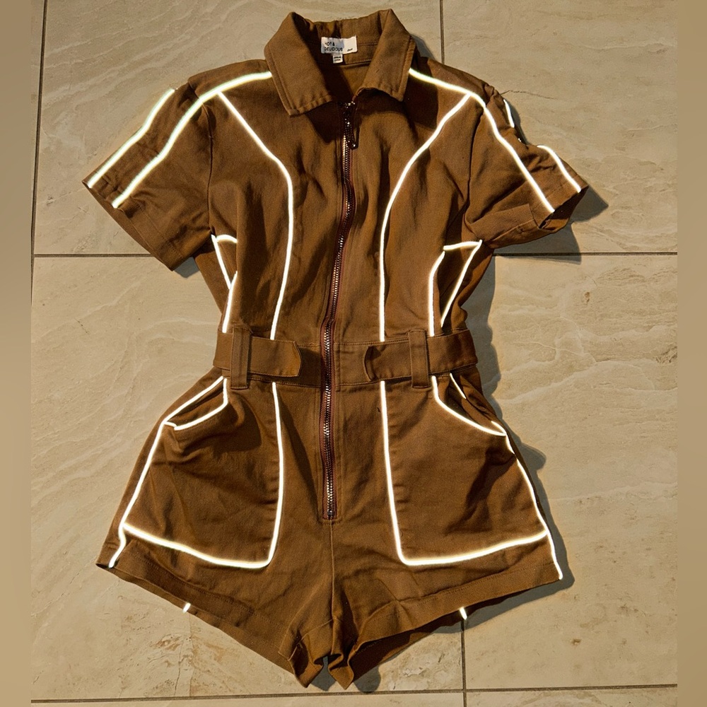 Jean jumpsuit with reflective lines from Hot & Delicious